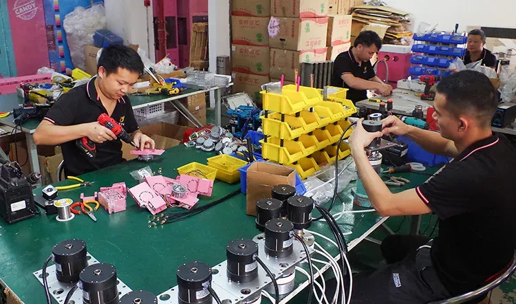 Technician assembling vending machine components at Red Rabbit